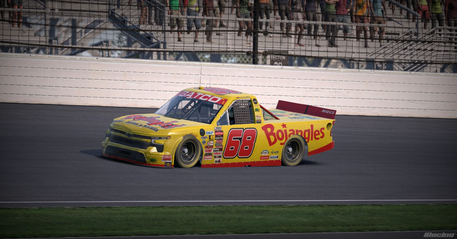 Number 68 Bojangles truck racing on track