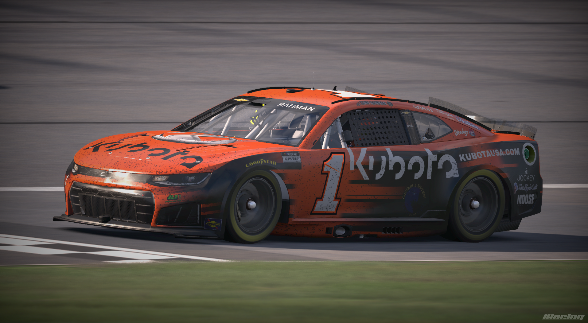 Orange number 1 Kubota car on track