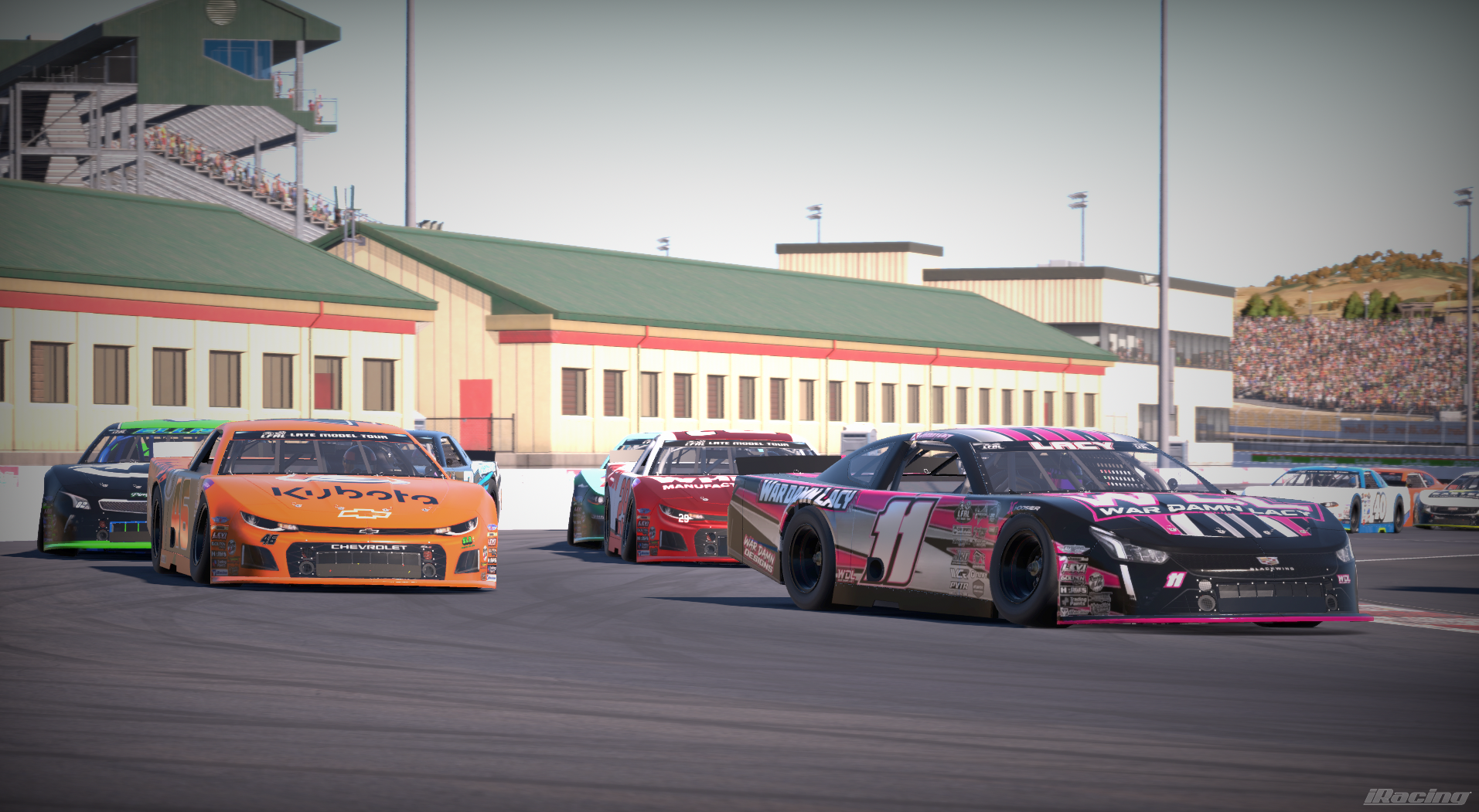 Orange number 46 Kubota late model racing in the pack
