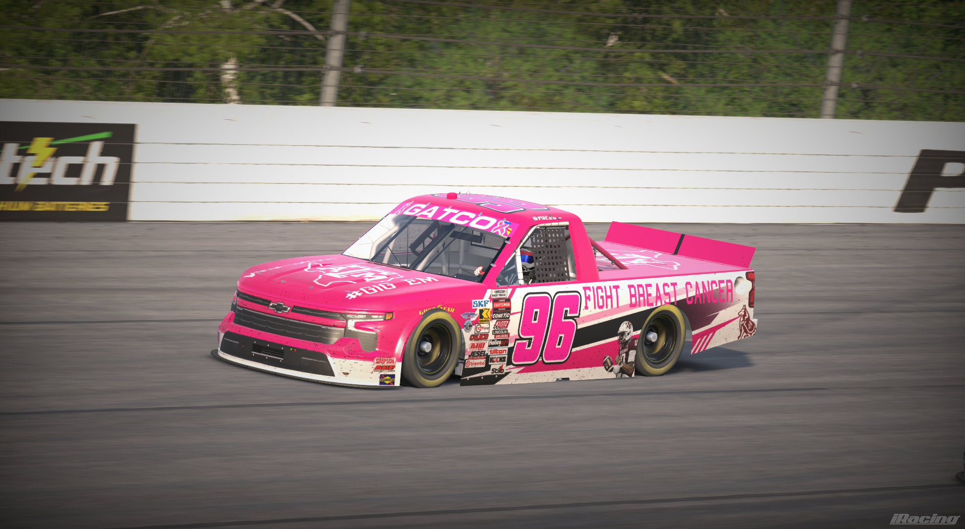 Pink number 96 Fight Breast Cancer truck on track