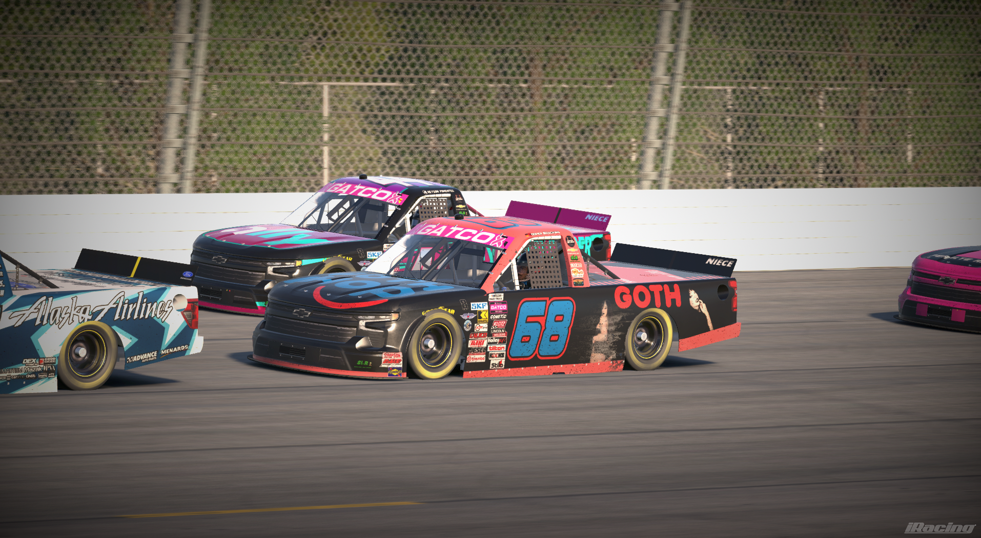 Number 68 Goth truck racing alongside number 44