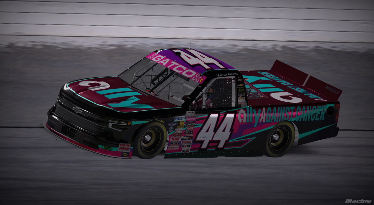 Number 44 Ally Against Cancer Chevrolet truck on track
