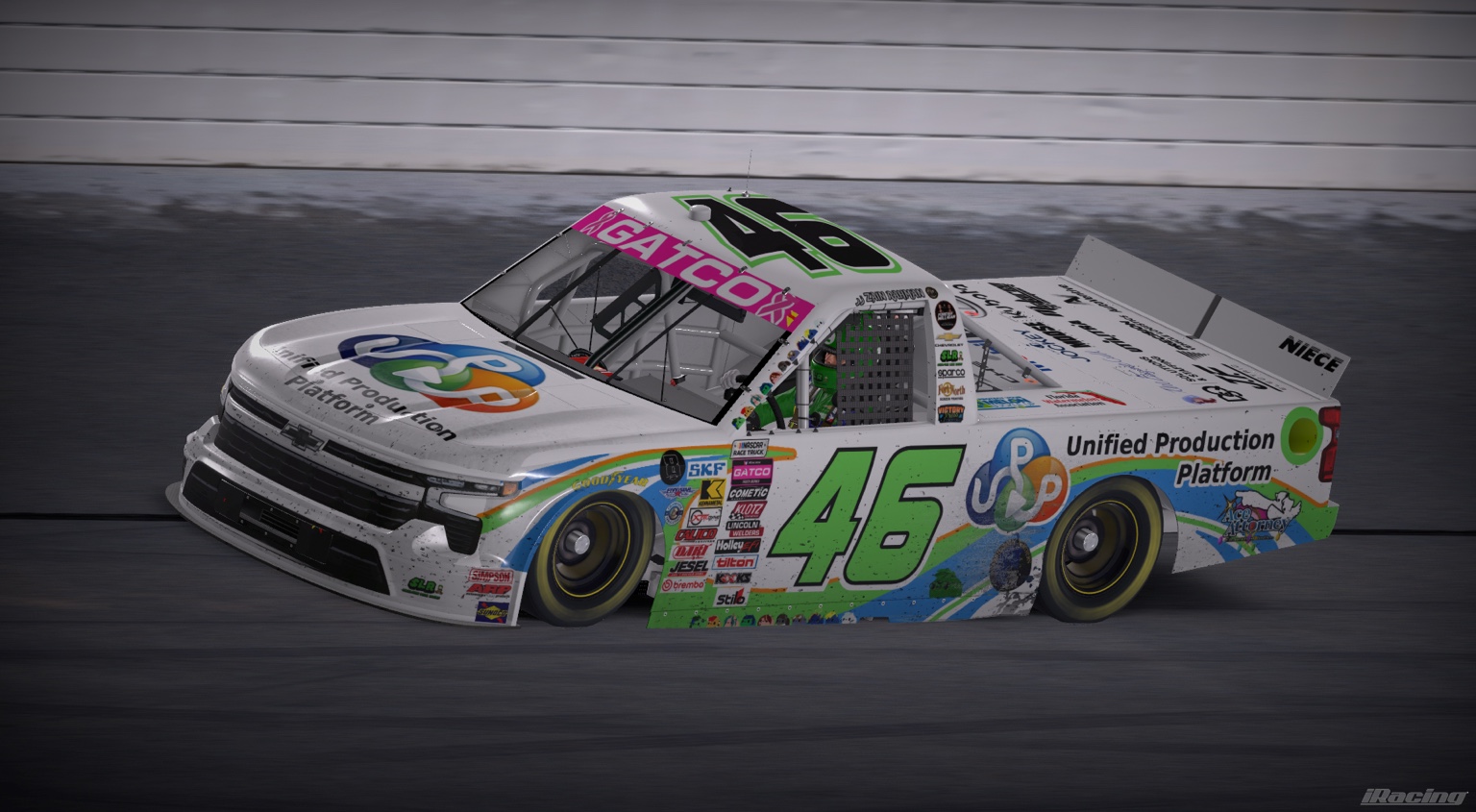White number 46 Unified Production Platform Chevrolet truck on track
