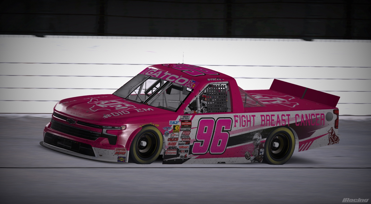 Pink number 96 Fight Breast Cancer Chevrolet truck on track
