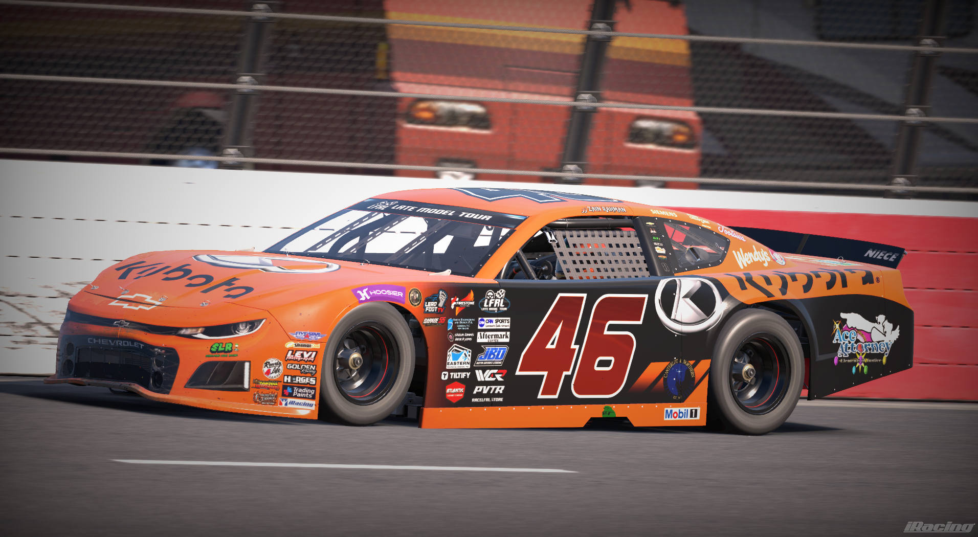 Orange and black number 46 Kubota Chevrolet late model viewed from the side