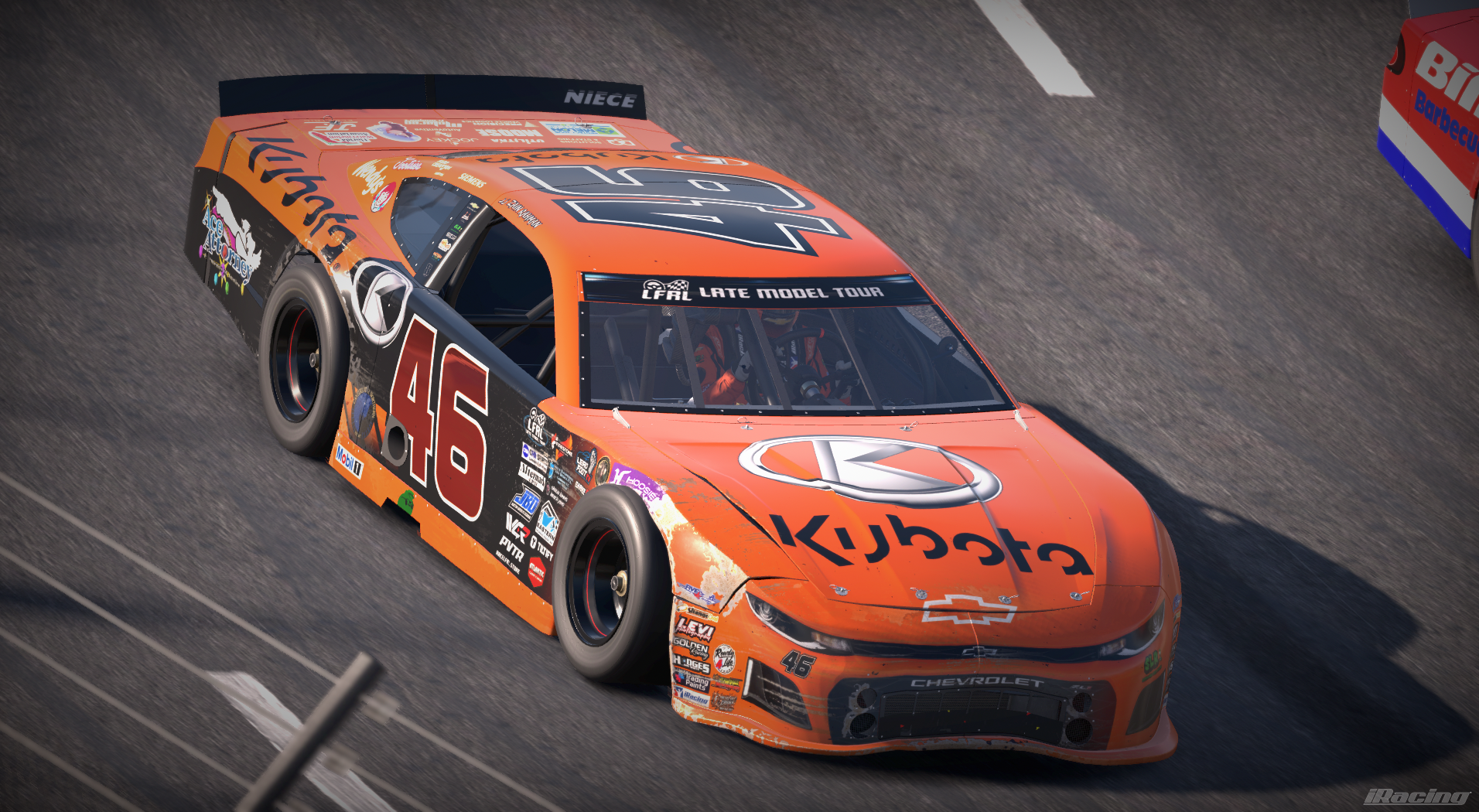 Orange and black number 46 Kubota Chevrolet late model viewed from above
