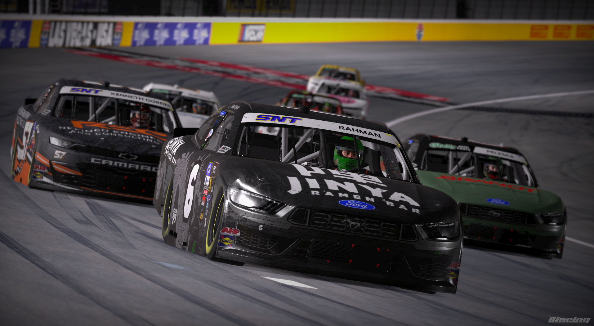 Black number 6 JINYA Ramen Bar Ford stock car racing in a pack